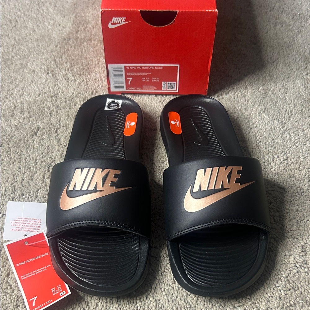 Nike Black Slides with Rose Gold Accents